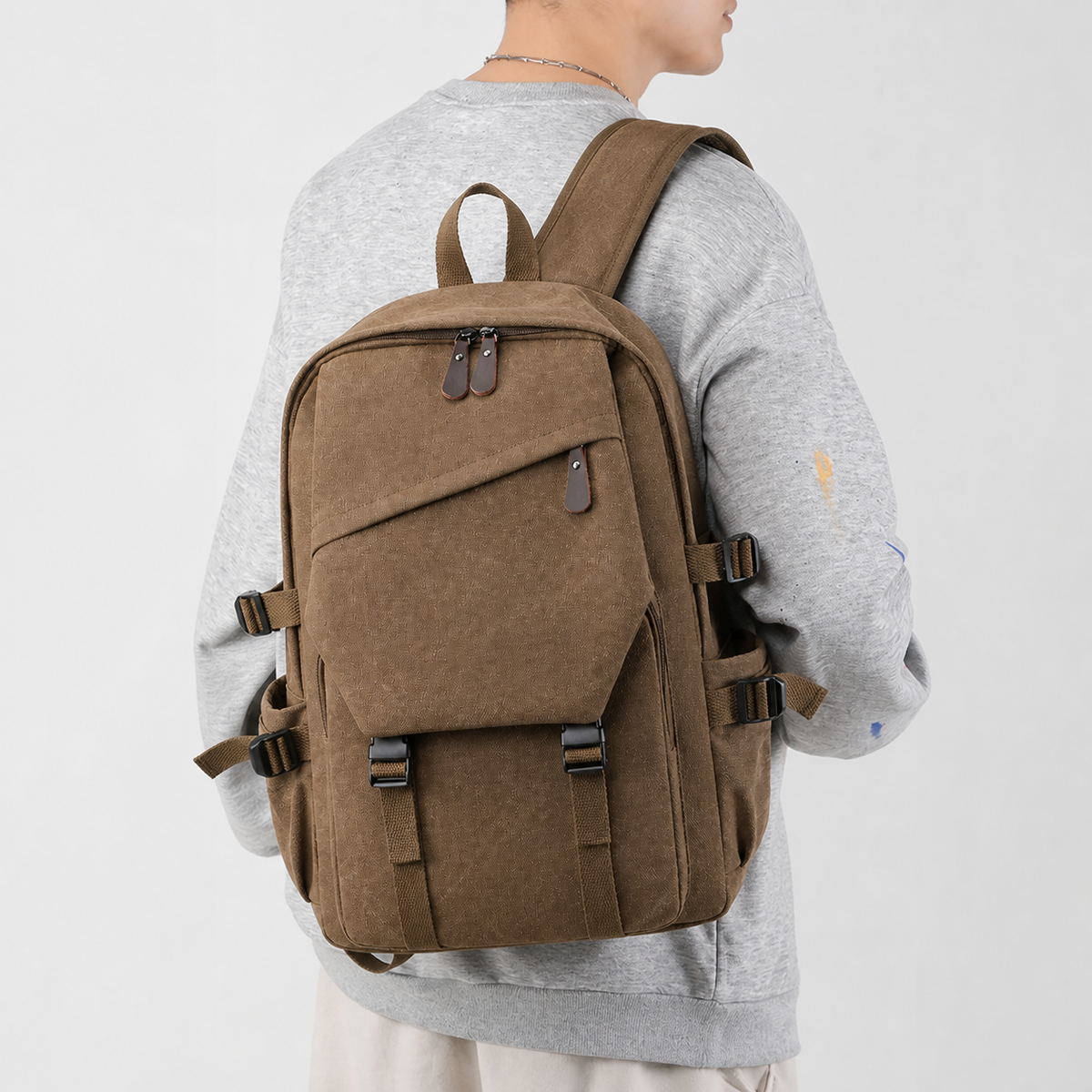 CALEN classic canvas backpack shown on body for scale